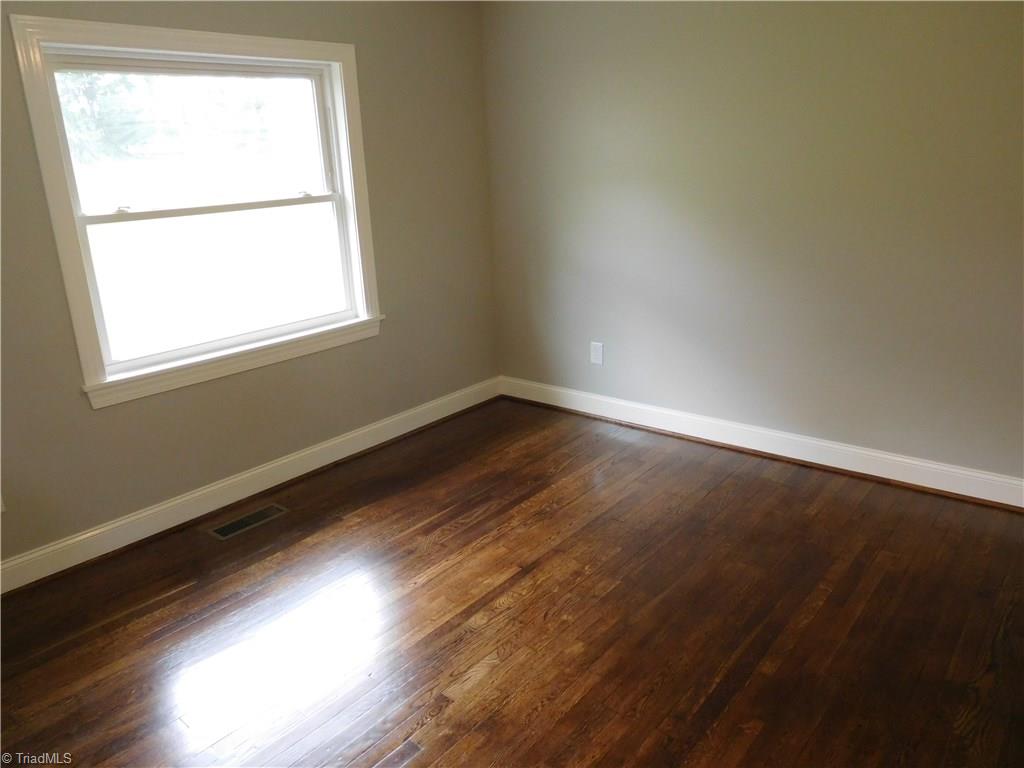255 Jones Road Winston-Salem, NC 27107 - Photo 26 of 26 2nd BR also has hardwood floors. This home has a split bedroom floor plan.