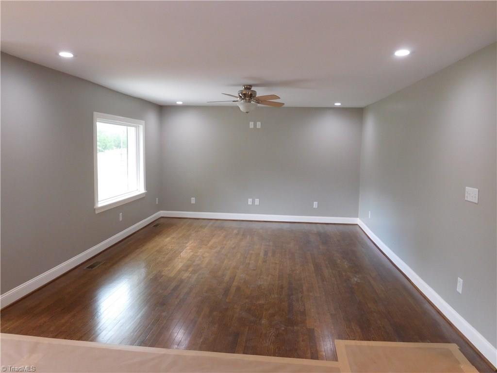 Large Living Room.  Hardwood floors in main living area of home & 3rd BR.  Fresh paint throughout home.  TOTAL TRANSFORMATION of home!