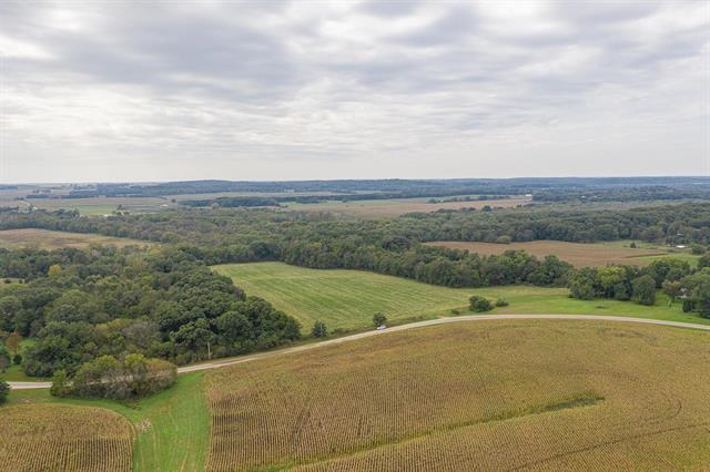 0 Blackhawk Road Oregon, IL 61061 - Photo 3 of 9 a view of a field with an ocean and trees
