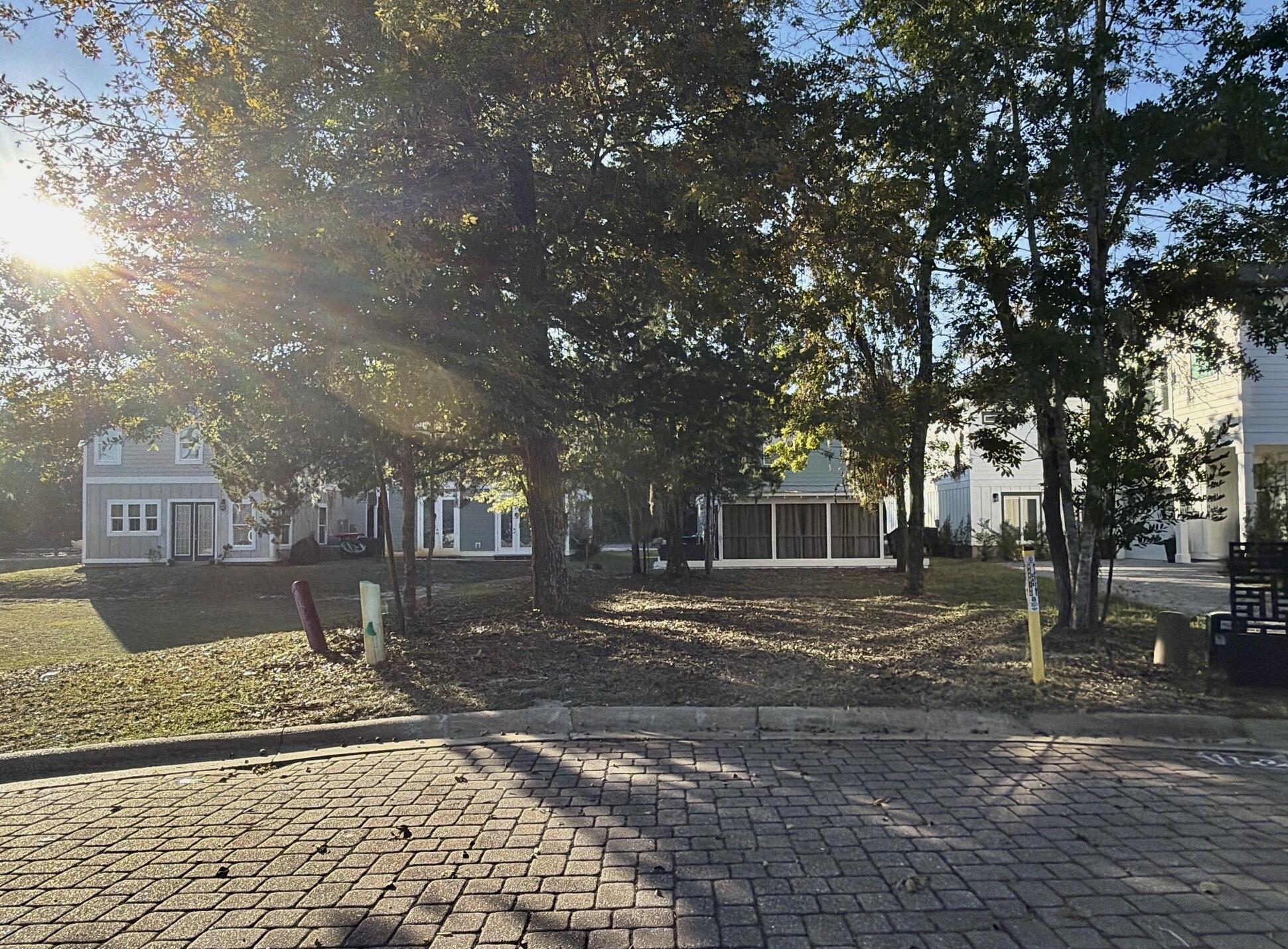 Lot 52 Reardon Way Santa Rosa Beach, FL 32459 - Photo 2 of 7 a front view of a house with a yard