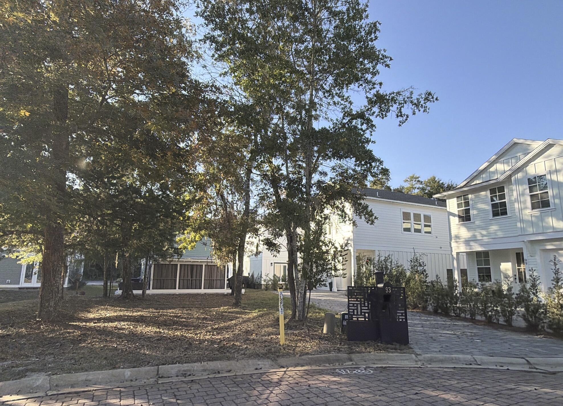 Lot 52 Reardon Way Santa Rosa Beach, FL 32459 - Photo 3 of 7 a front view of a house with a yard
