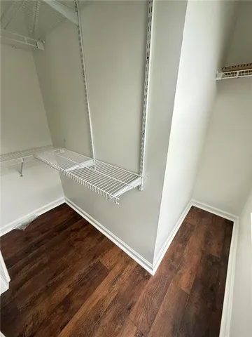 a view of an empty walk in closet