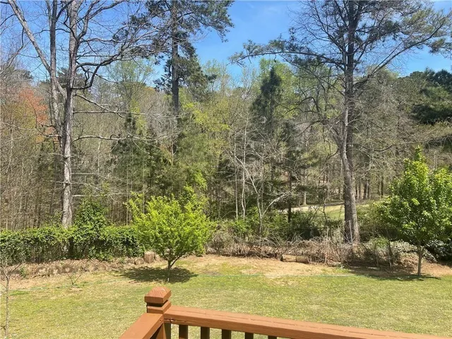a view of a yard with an trees