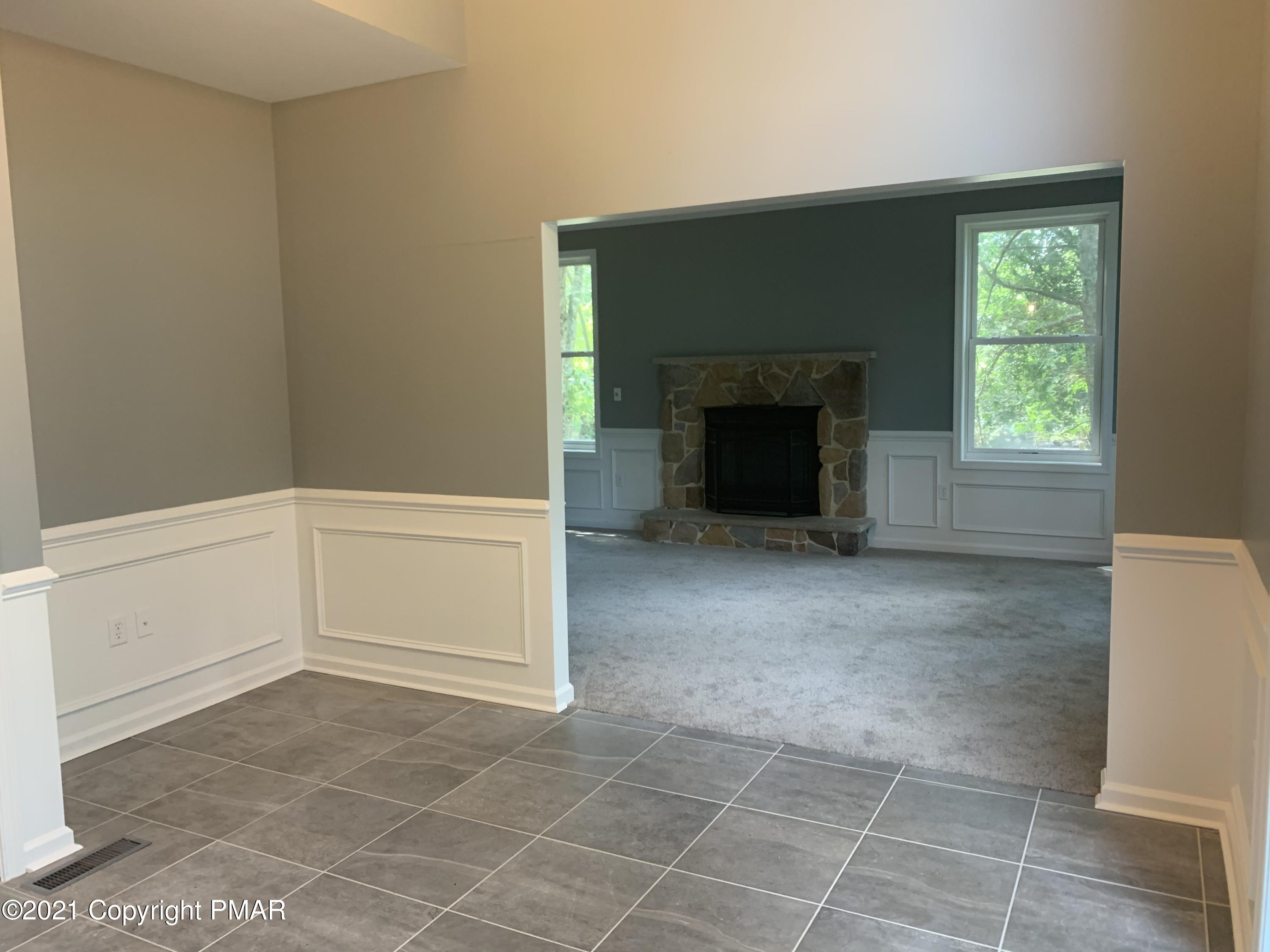 136 Pike Road Bushkill, PA 18324 - Photo 15 of 35 a view of an empty room with a fireplace