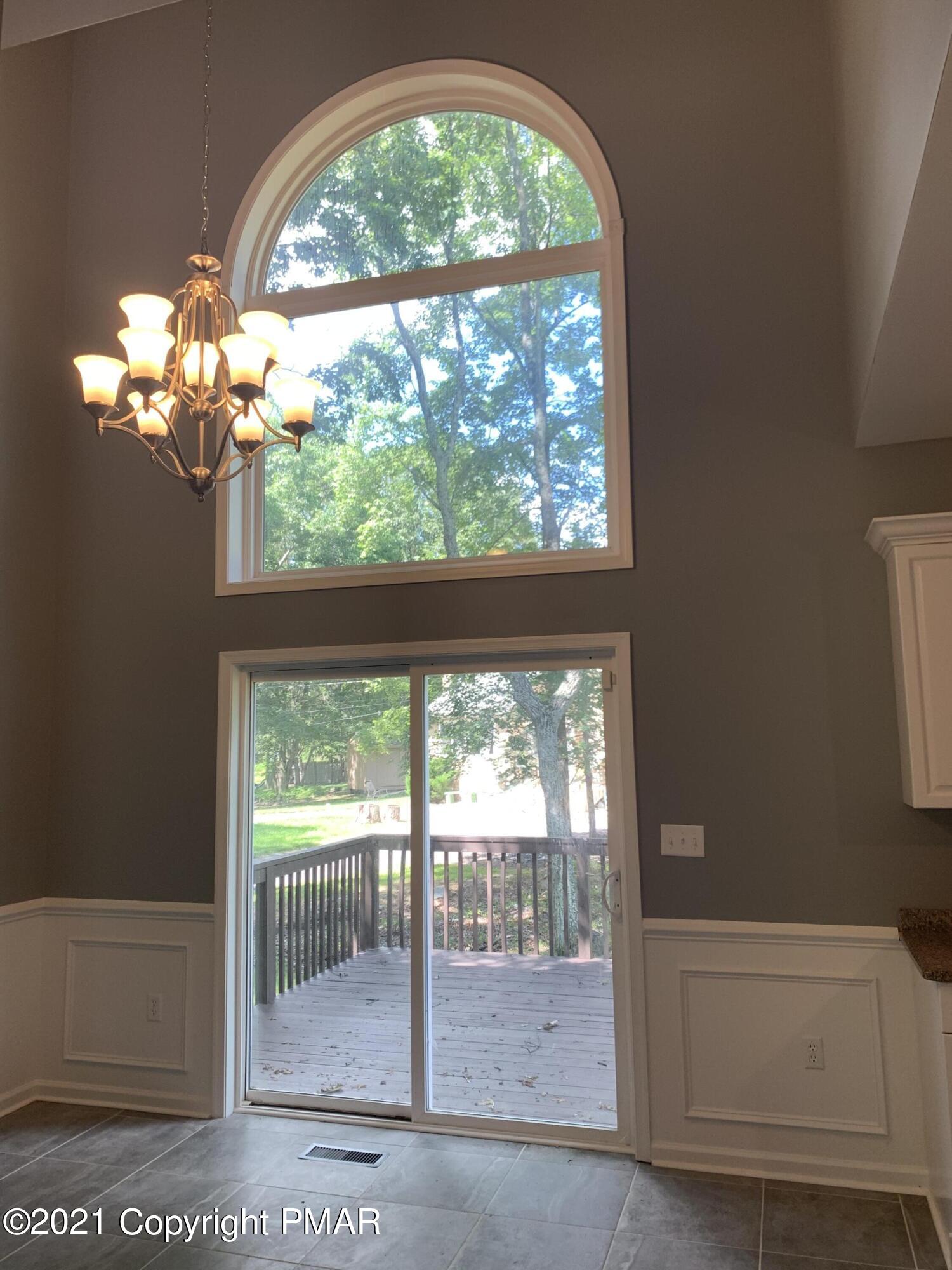 136 Pike Road Bushkill, PA 18324 - Photo 16 of 35 a view of a livingroom with a large window