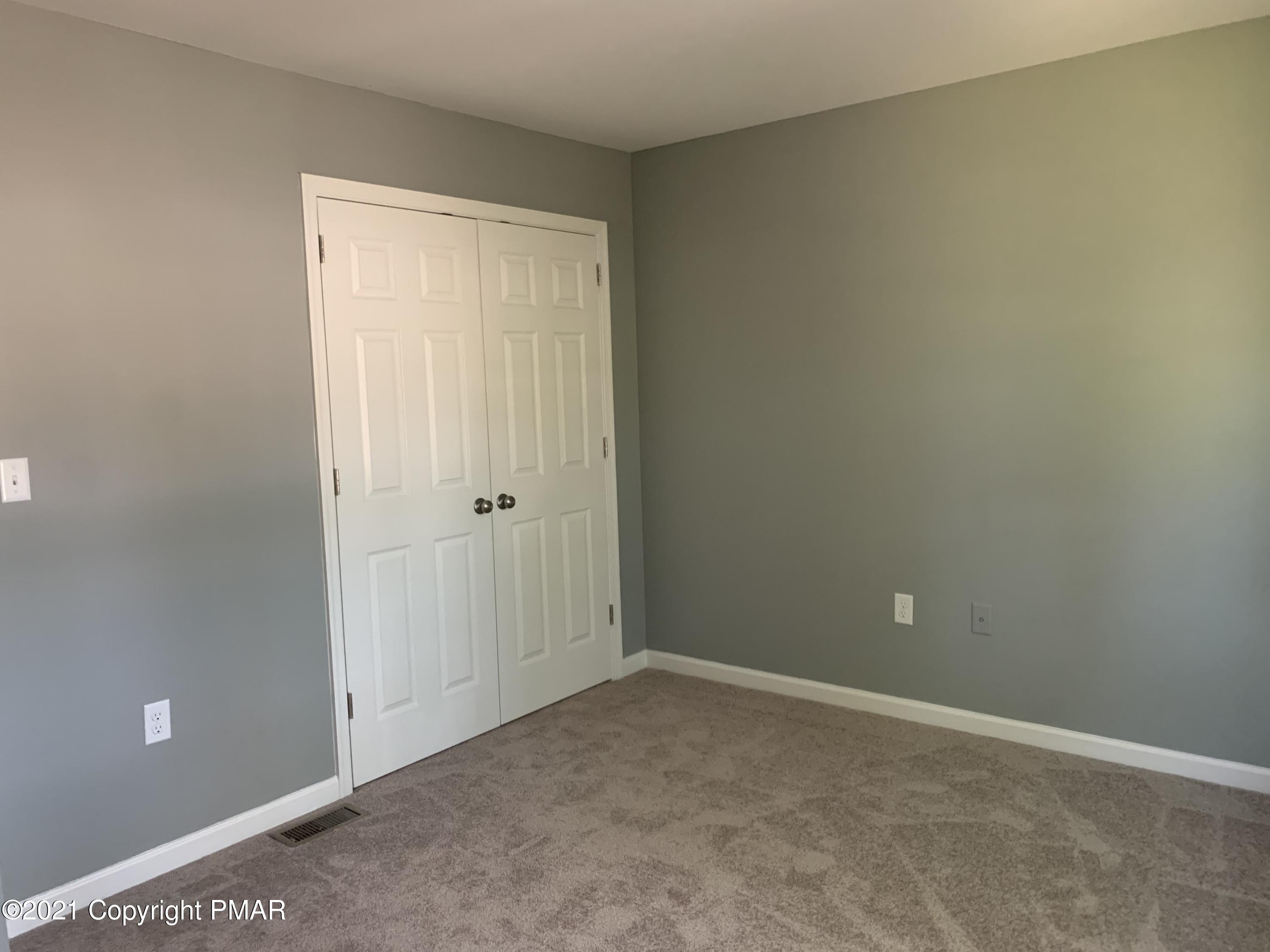 136 Pike Road Bushkill, PA 18324 - Photo 21 of 35 a view of an empty room