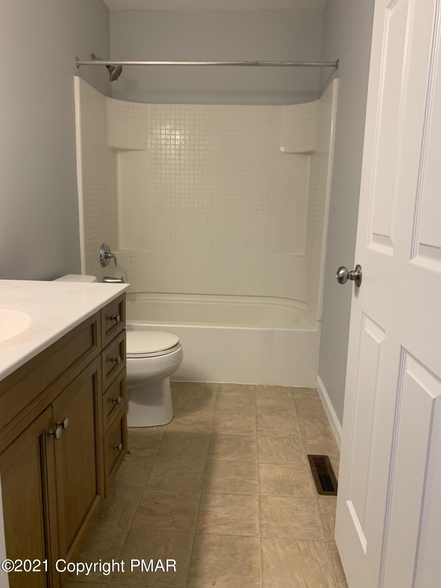 136 Pike Road Bushkill, PA 18324 - Photo 25 of 35 a bathroom with a sink a toilet and shower