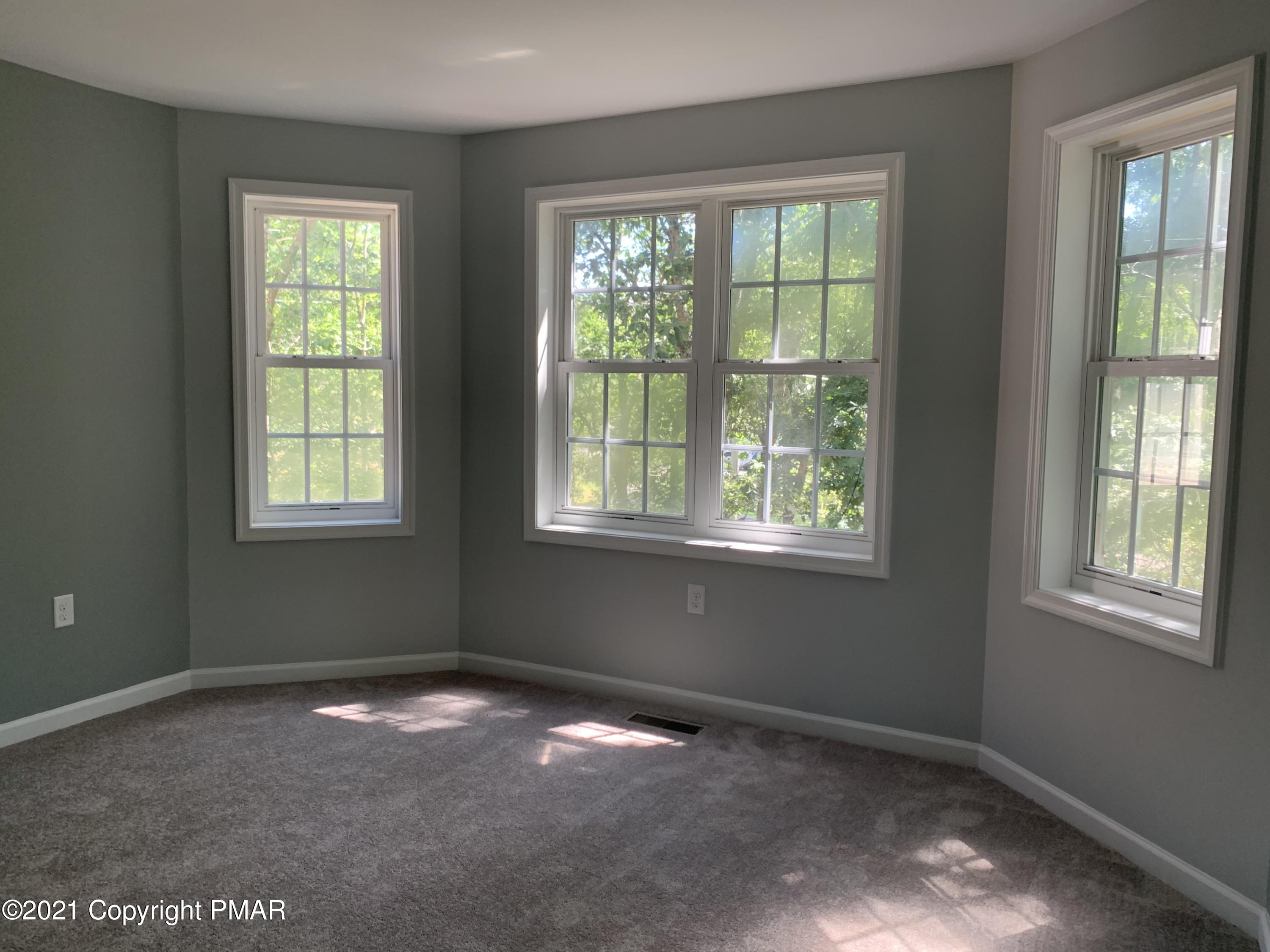136 Pike Road Bushkill, PA 18324 - Photo 30 of 35 a view of an empty room with a window