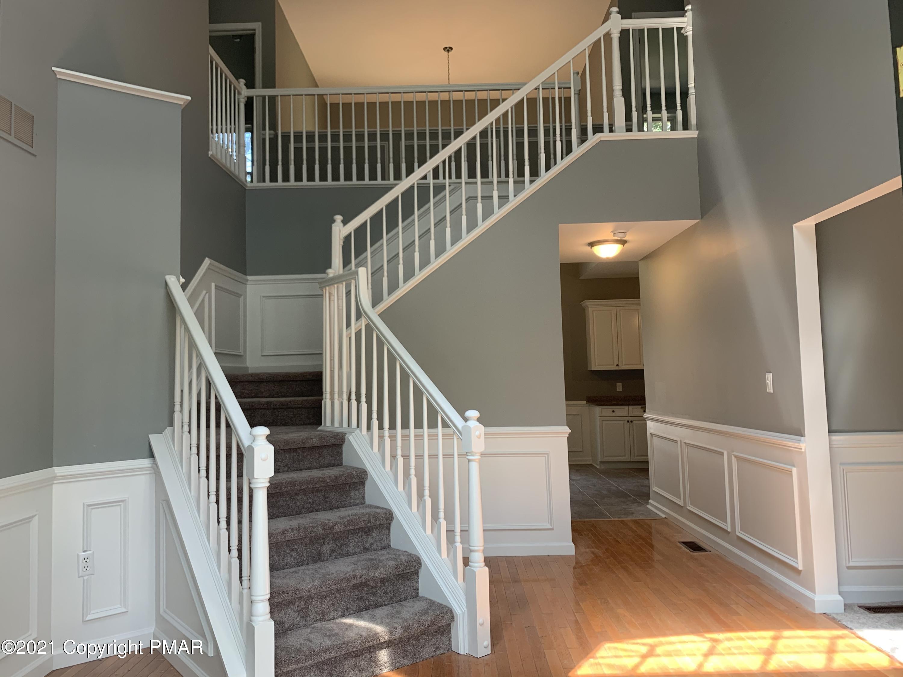 136 Pike Road Bushkill, PA 18324 - Photo 3 of 35 a view of entryway and hall with wooden floor