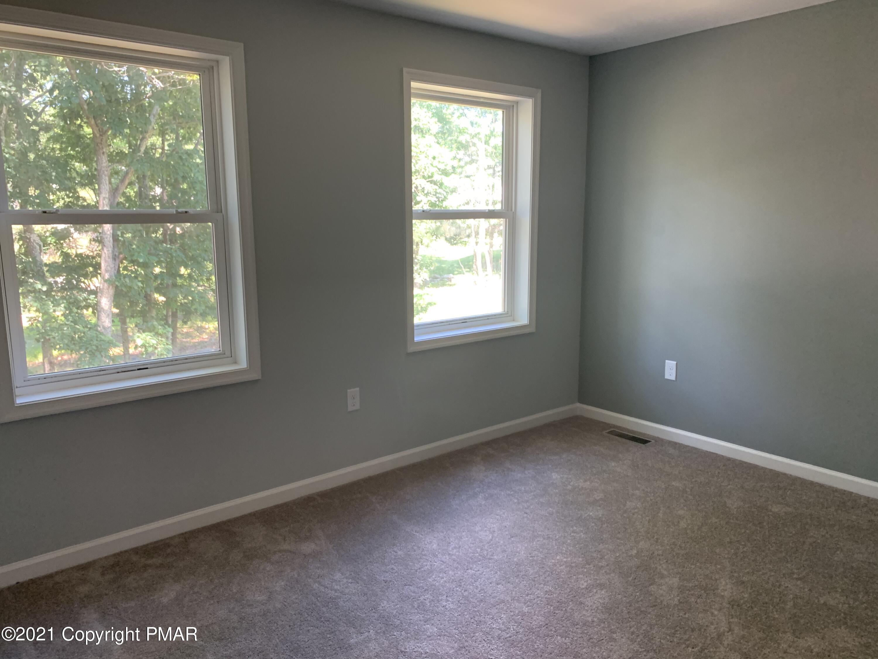 136 Pike Road Bushkill, PA 18324 - Photo 33 of 35 an empty room with a window
