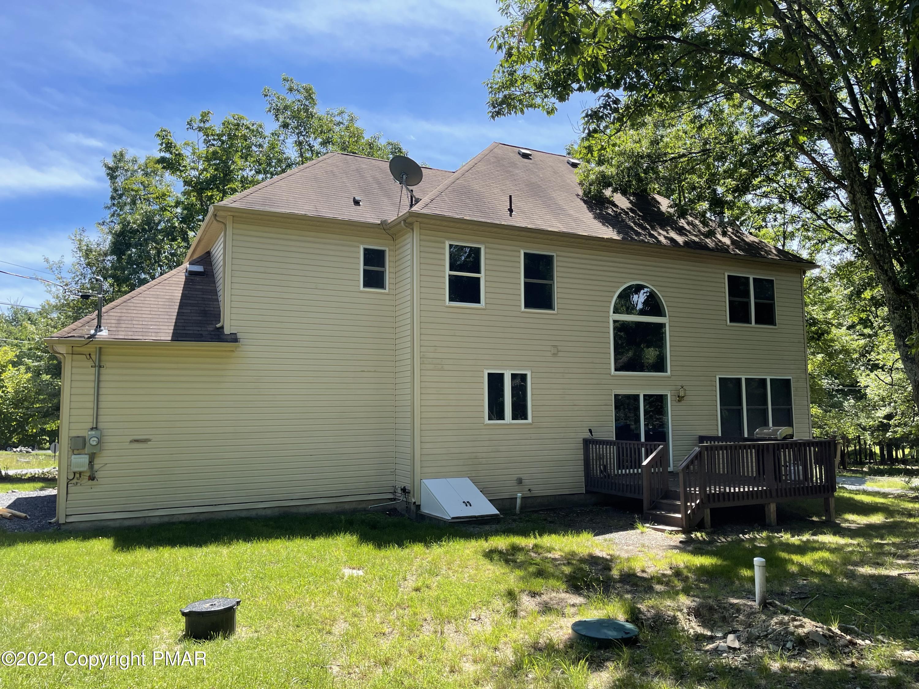136 Pike Road Bushkill, PA 18324 - Photo 35 of 35 a view of a house with swimming pool
