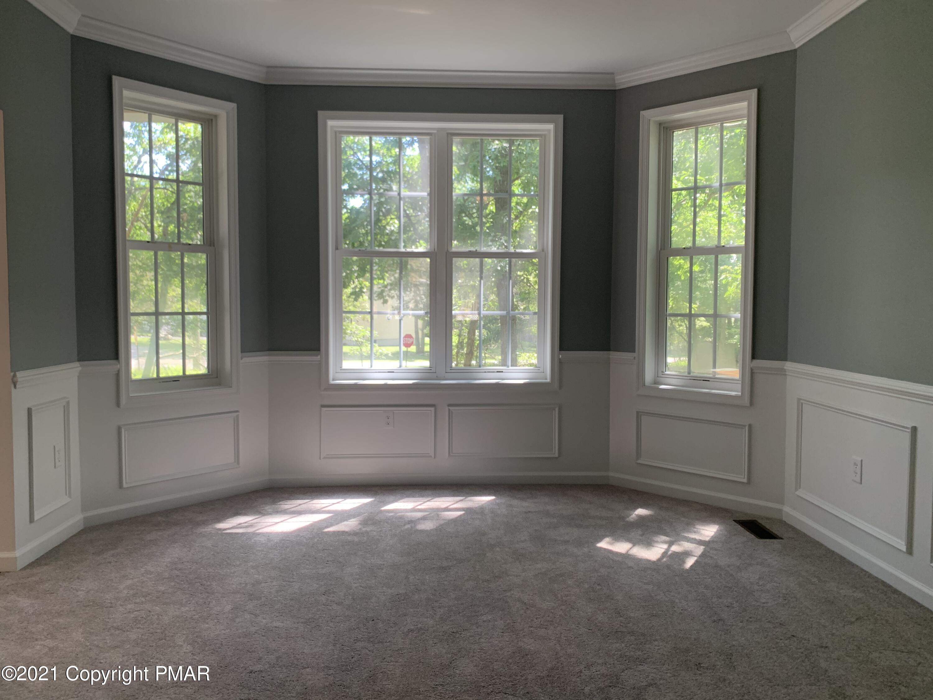 136 Pike Road Bushkill, PA 18324 - Photo 6 of 35 an empty room with windows