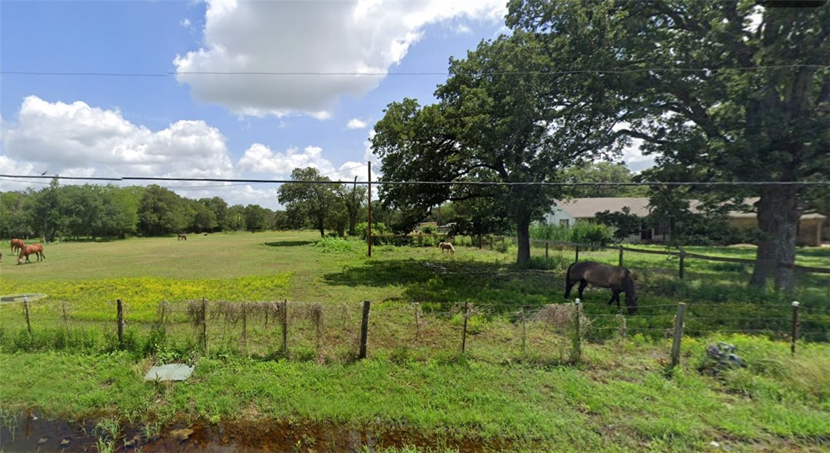 4113 Old Hearne Road Bryan, TX 77803 - Photo 1 of 1 View of yard featuring a rural view