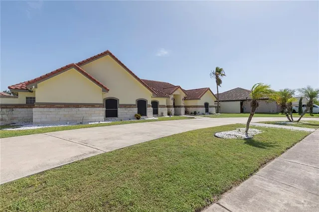a house view with a garden space