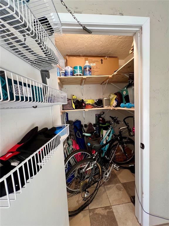 2101 Hammock Pine Boulevard, Unit 2101 Clearwater, FL 33761 - Photo 19 of 24 a view of a storage room with a lot of stuff