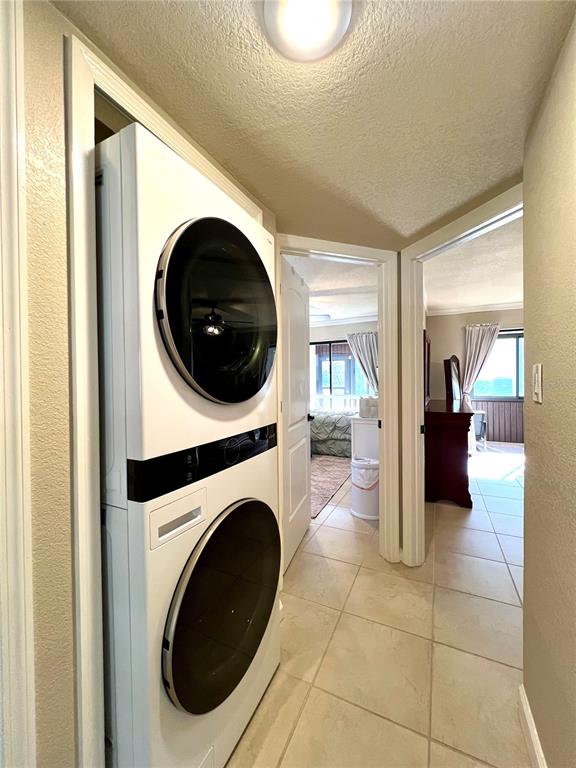 2101 Hammock Pine Boulevard, Unit 2101 Clearwater, FL 33761 - Photo 7 of 24 a view of a hallway with washer and dryer
