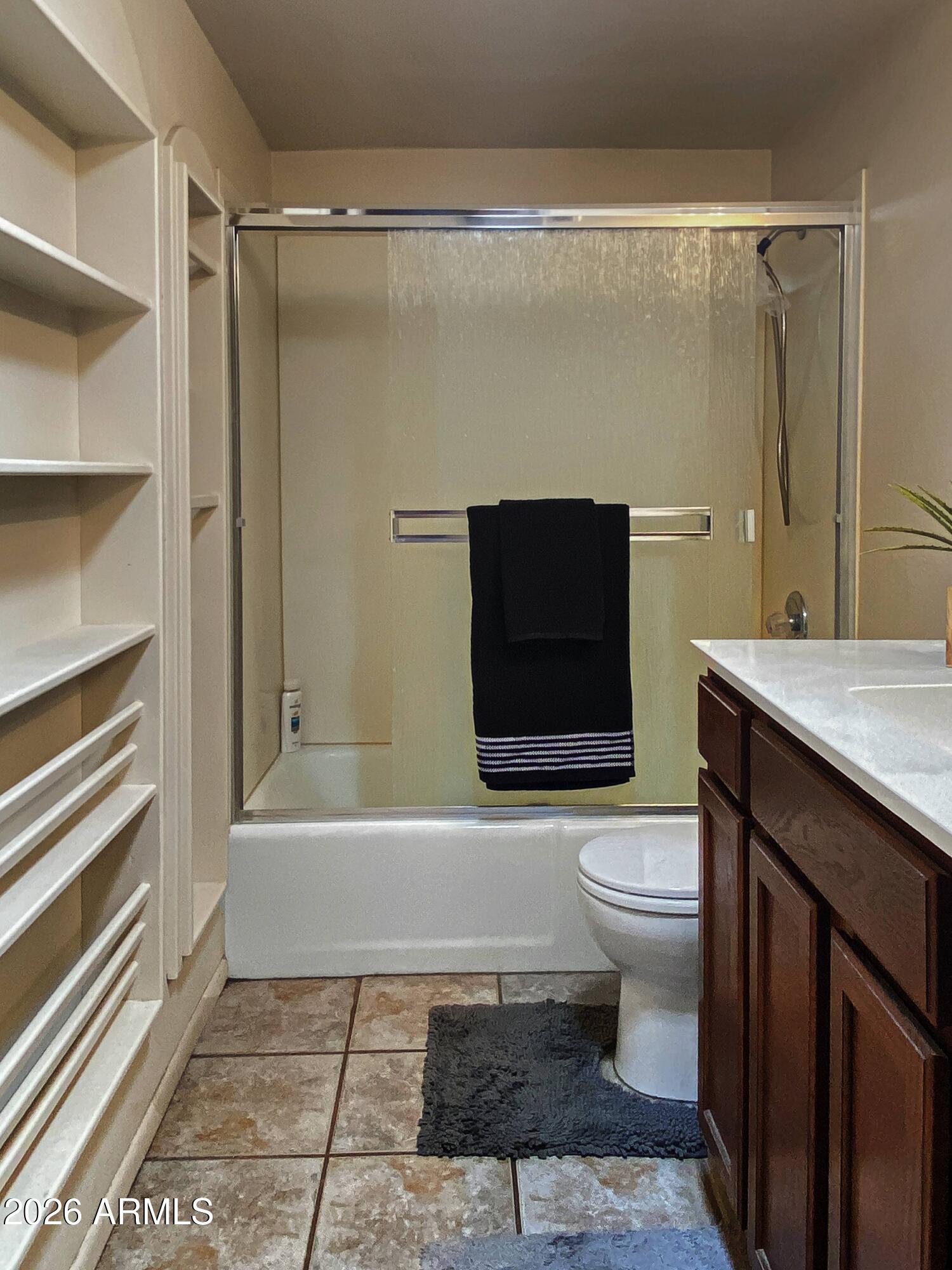 550 Barcelona Road Sedona, AZ 86336 - Photo 15 of 32 a bathroom with a sink a toilet and shower
