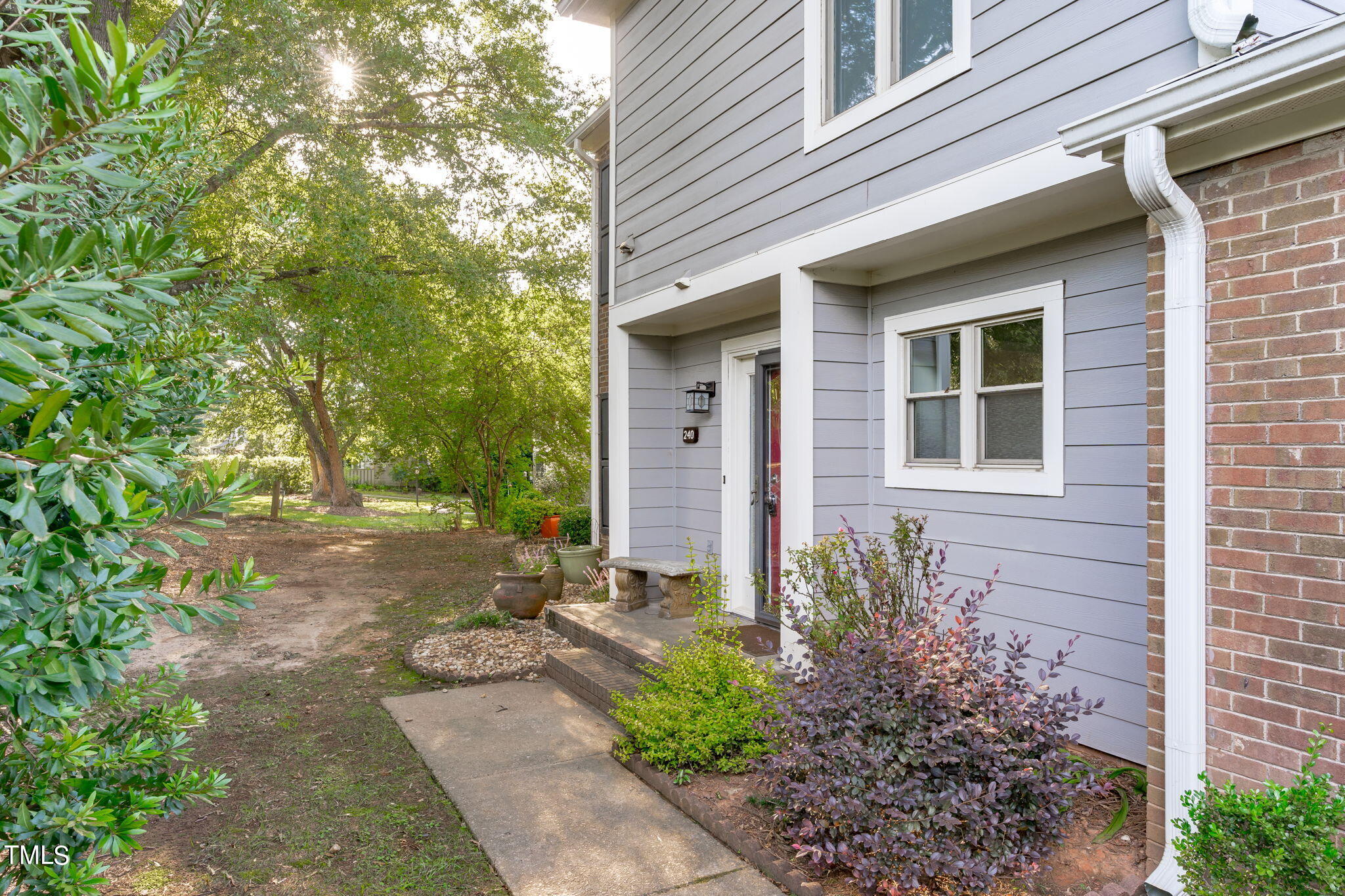 240 Clancy Circle Cary, NC 27511 - Photo 27 of 27 a front view of a house with garden
