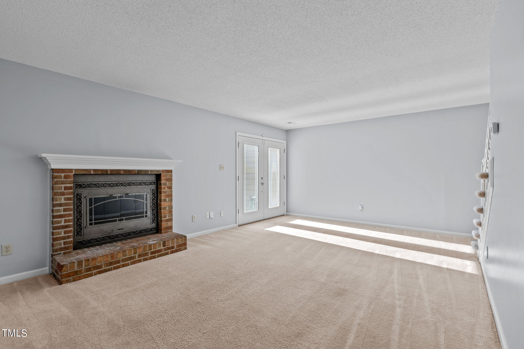 240 Clancy Circle Cary, NC 27511 - Photo 5 of 27 a view of empty room with a fireplace