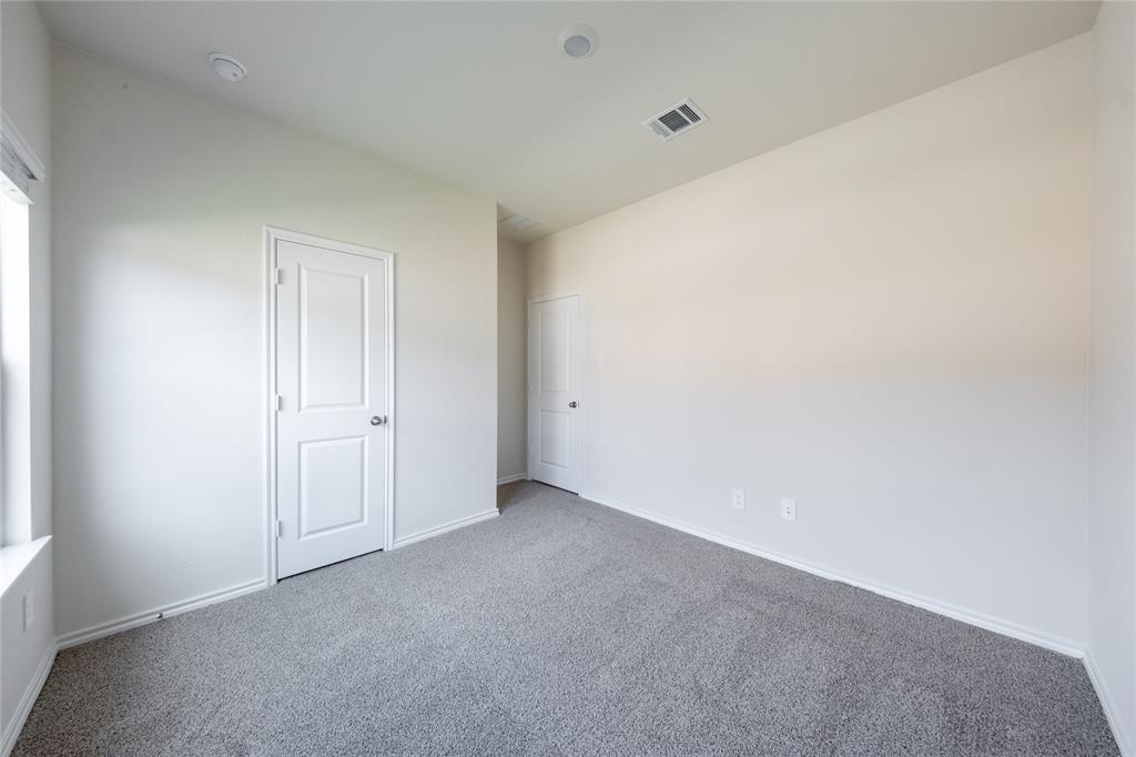 13156 Dawson Drive Providence Village, TX 76227 - Photo 15 of 31 a view of an empty room