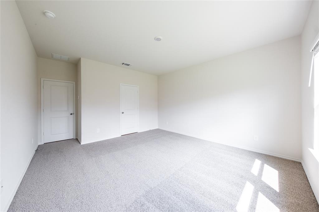 13156 Dawson Drive Providence Village, TX 76227 - Photo 18 of 31 a view of an empty room