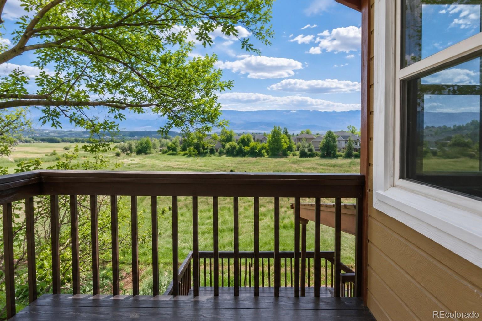 1914 Terrace Drive Highlands Ranch, CO 80126 - Photo 27 of 47 a view of a balcony with wooden floor