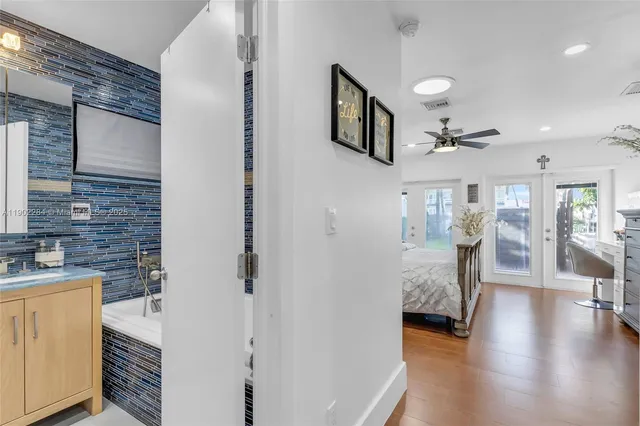 a view of a patio with a table and chairs