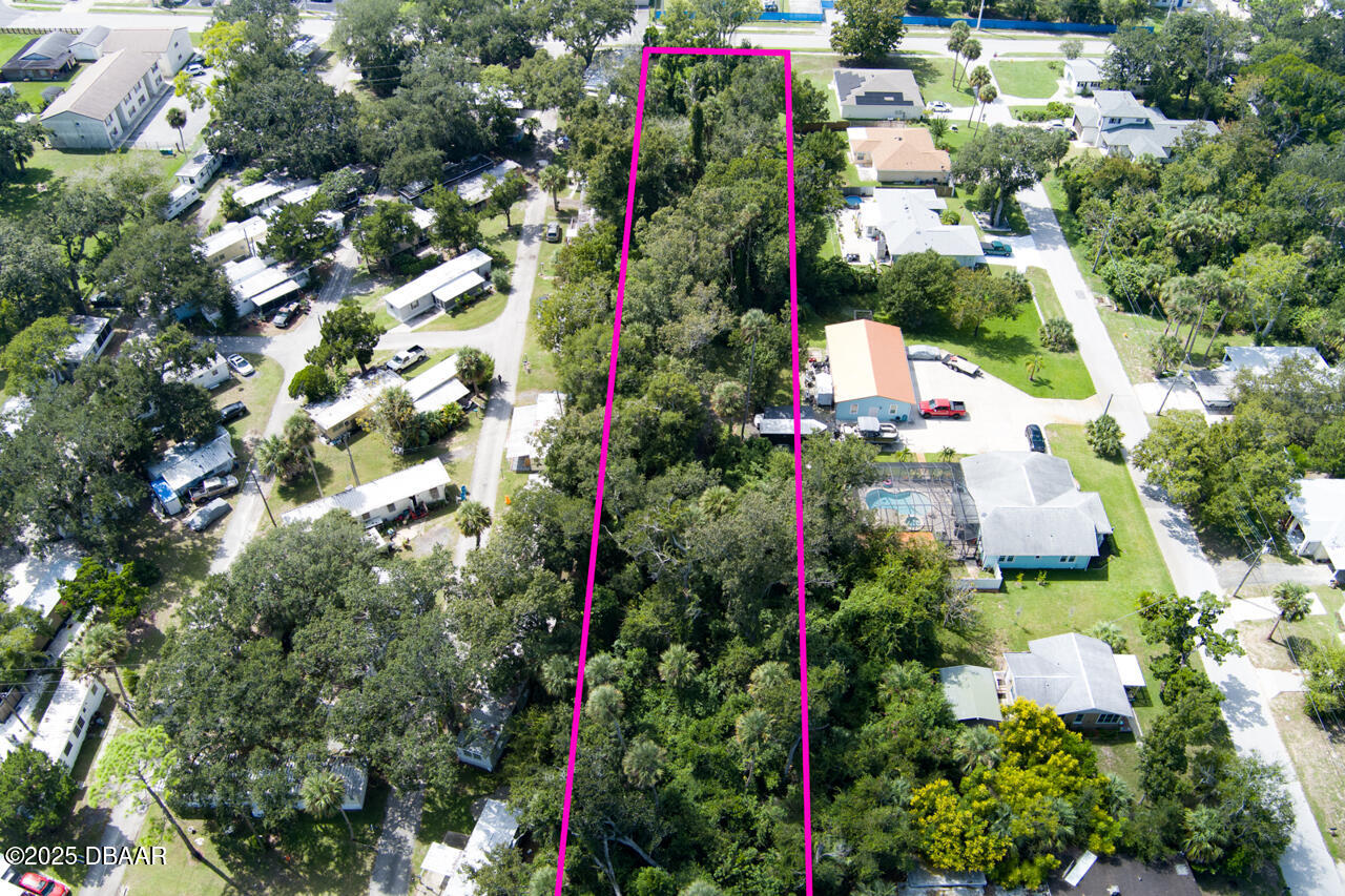 0 South Ridgewood Avenue South Daytona, FL 32119 - Photo 2 of 9 an aerial view of multiple house