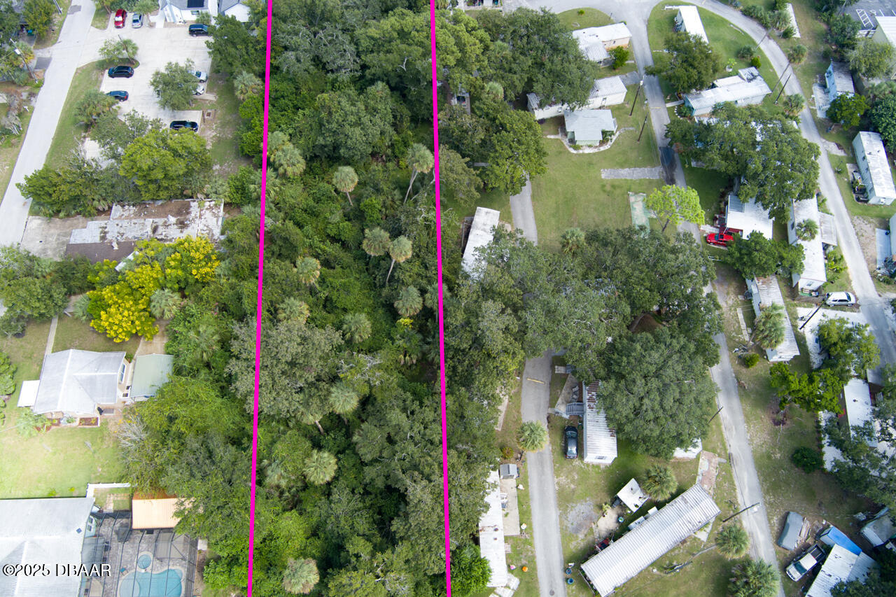 0 South Ridgewood Avenue South Daytona, FL 32119 - Photo 5 of 9 an aerial view of residential houses with outdoor space