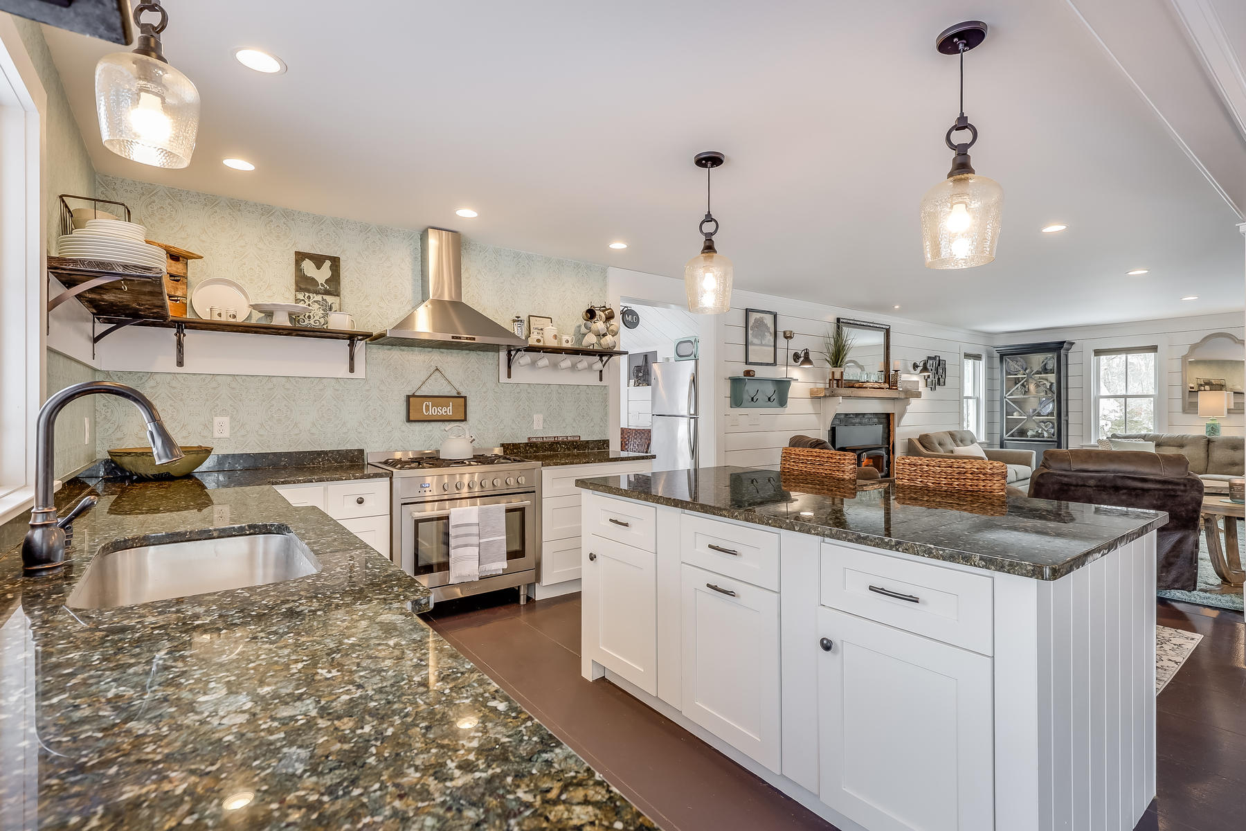 640 Setucket Road East Dennis, MA 02660 - Photo 12 of 57 a kitchen with stainless steel appliances granite countertop a sink stove and cabinets