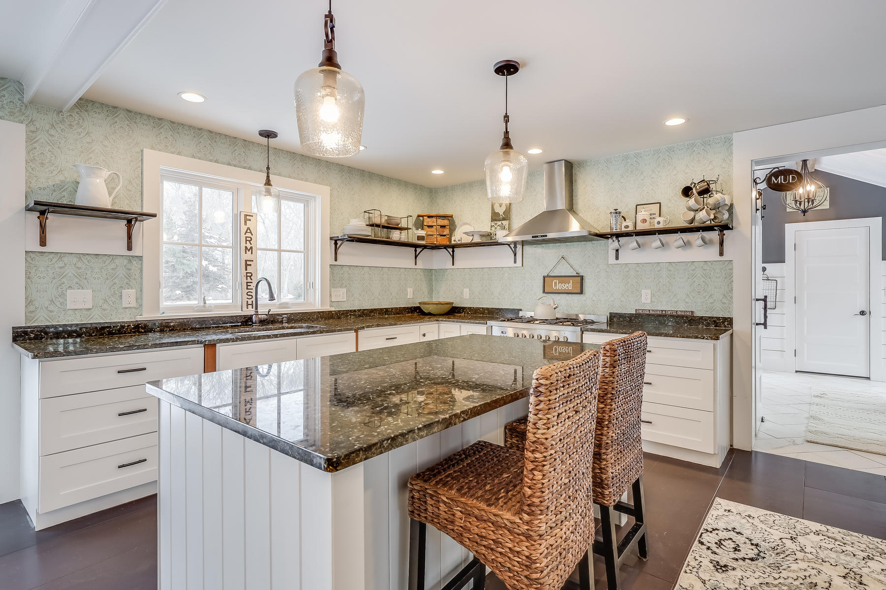 640 Setucket Road East Dennis, MA 02660 - Photo 17 of 57 a kitchen with stainless steel appliances granite countertop a sink a stove and a wooden floors