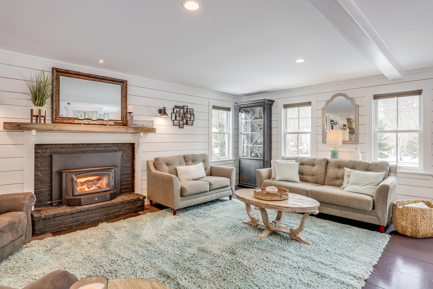 640 Setucket Road East Dennis, MA 02660 - Photo 27 of 57 a living room with furniture a window and a fireplace