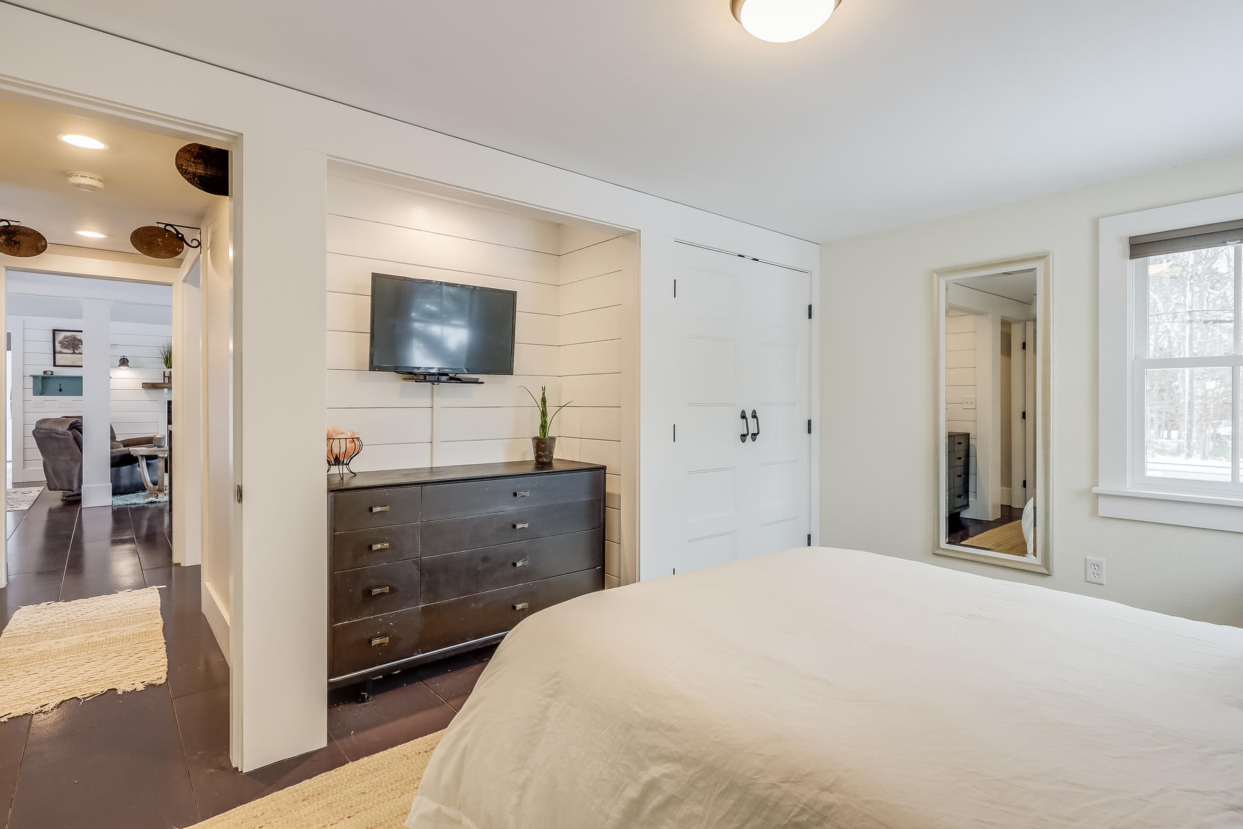 640 Setucket Road East Dennis, MA 02660 - Photo 29 of 57 a bedroom with a bed and a flat screen tv