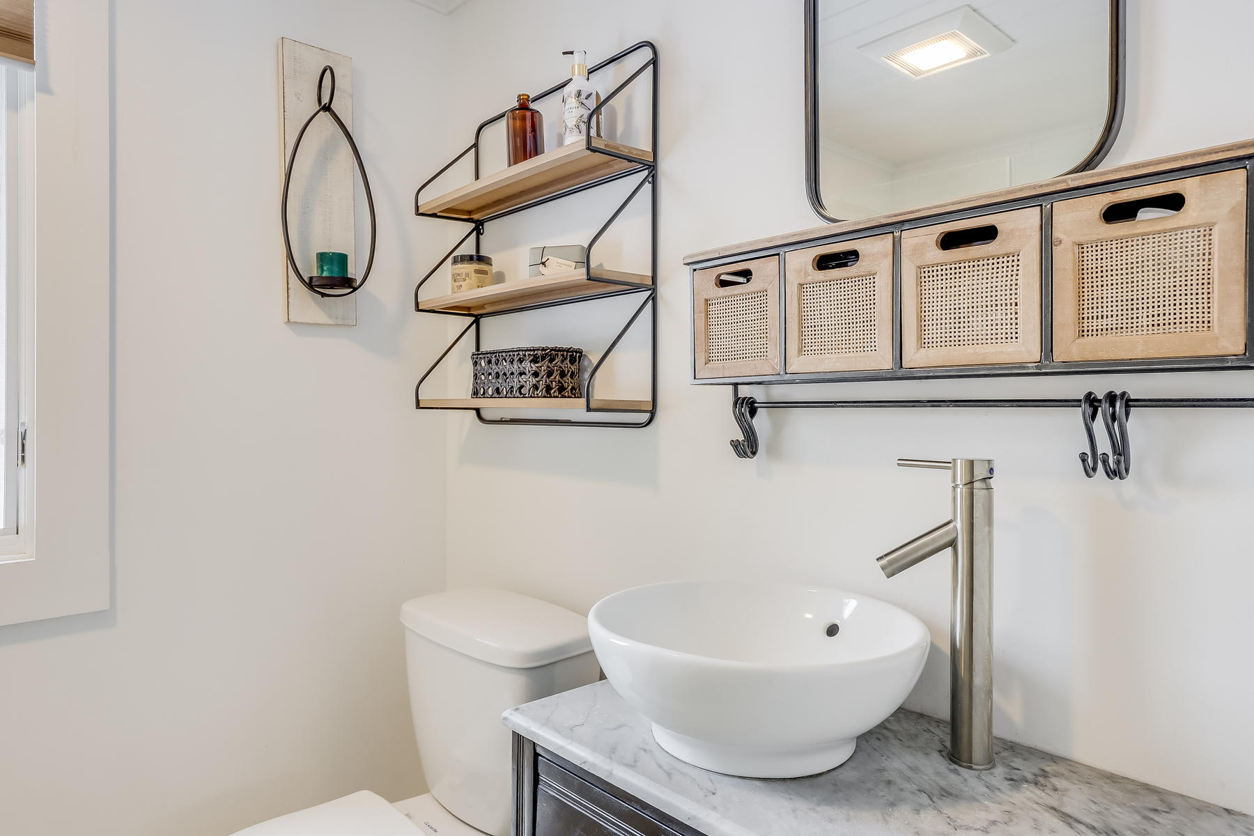 640 Setucket Road East Dennis, MA 02660 - Photo 32 of 57 a bathroom with a toilet a sink and mirror