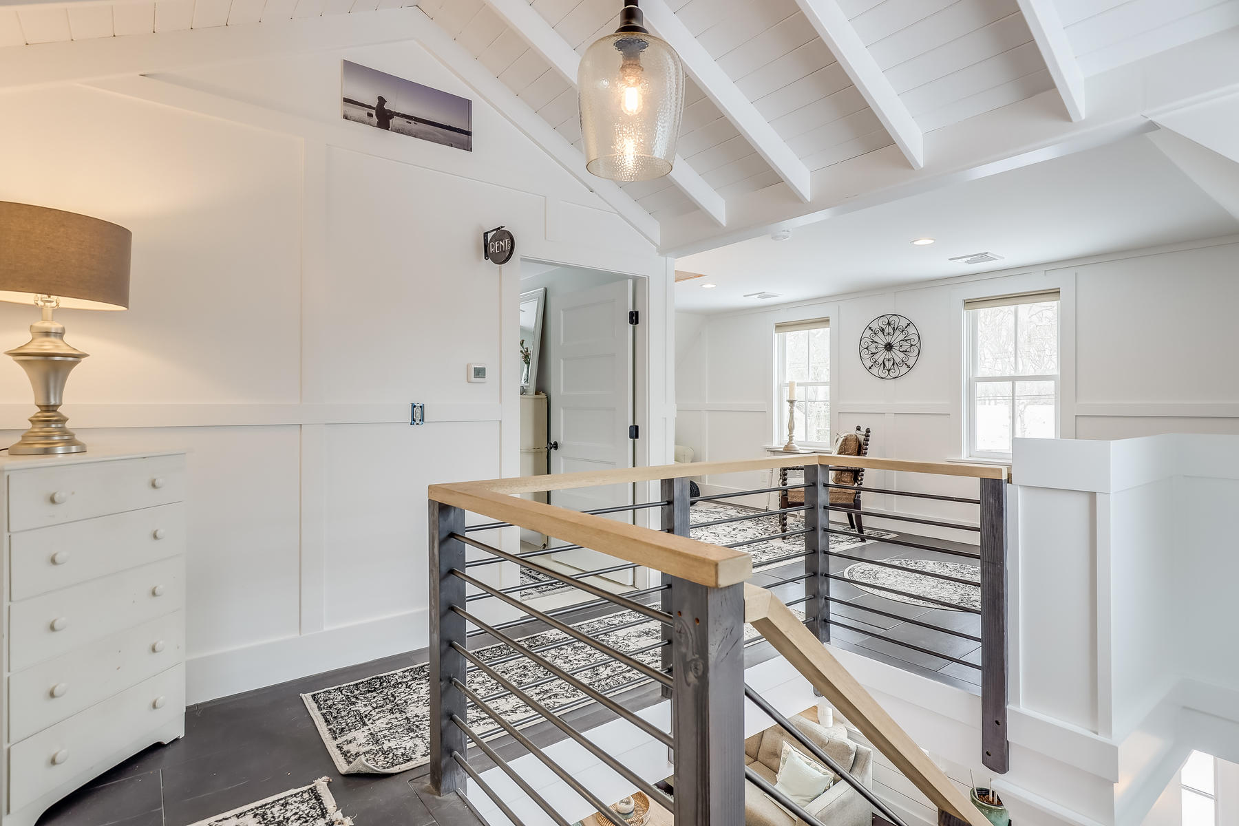 640 Setucket Road East Dennis, MA 02660 - Photo 36 of 57 a view of a a dining hall with furniture and wooden floor