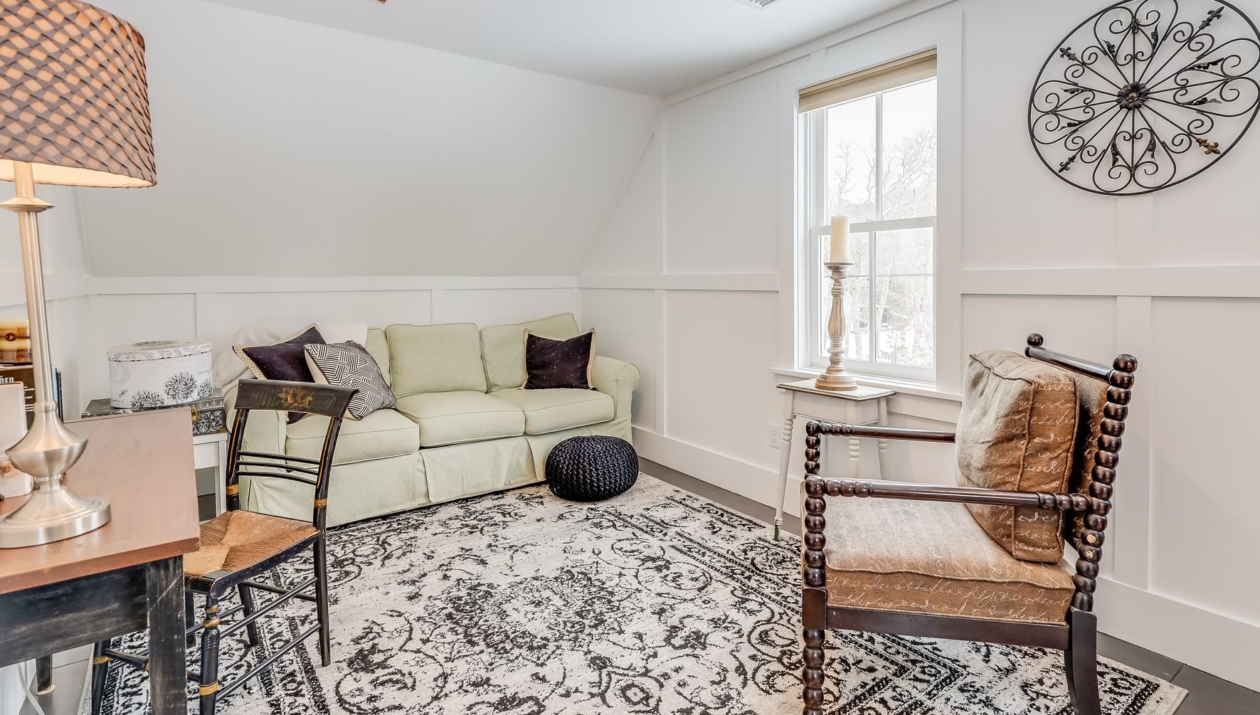 640 Setucket Road East Dennis, MA 02660 - Photo 37 of 57 a living room with furniture a window and a table