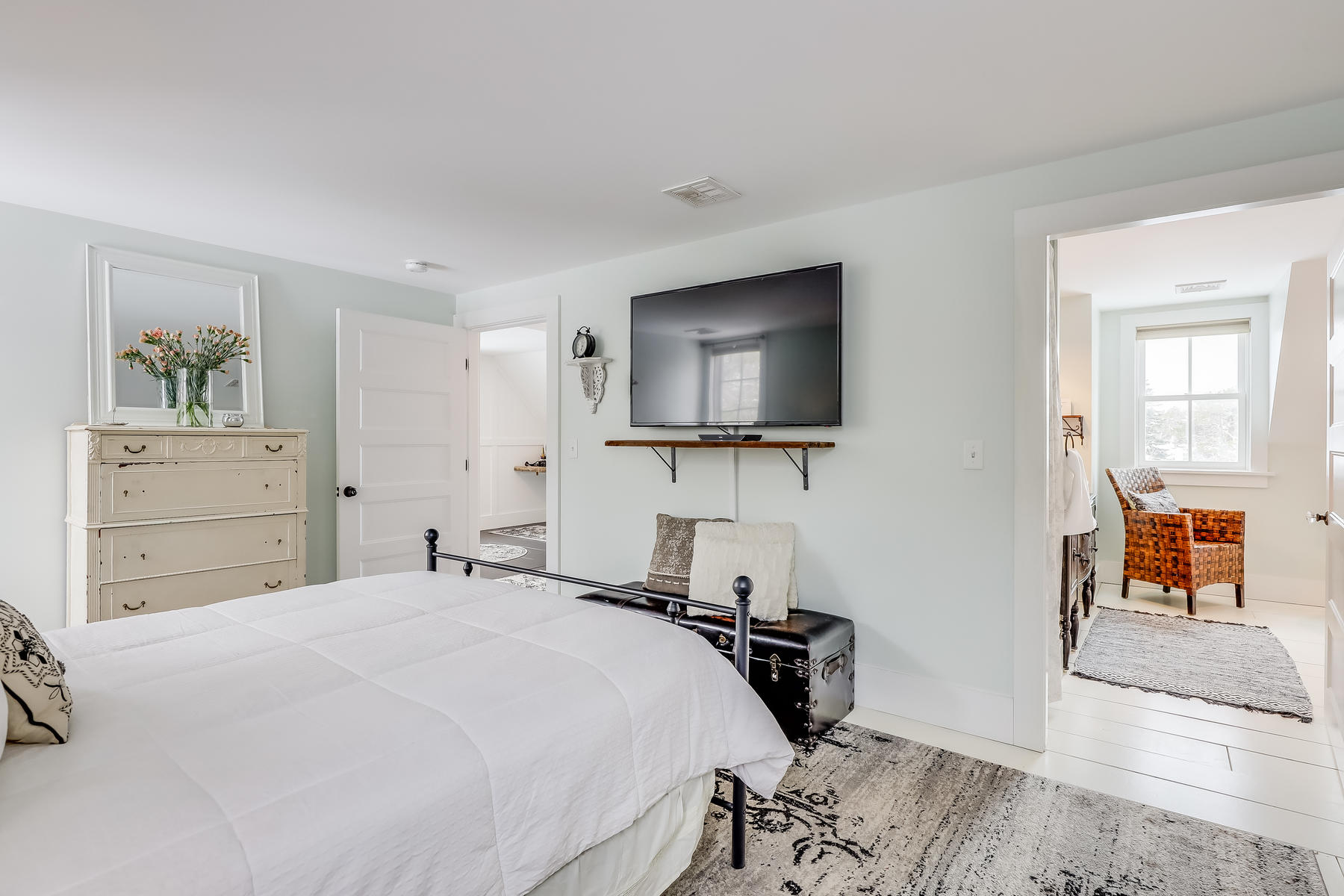 640 Setucket Road East Dennis, MA 02660 - Photo 39 of 57 a bedroom with a bed and a flat screen tv