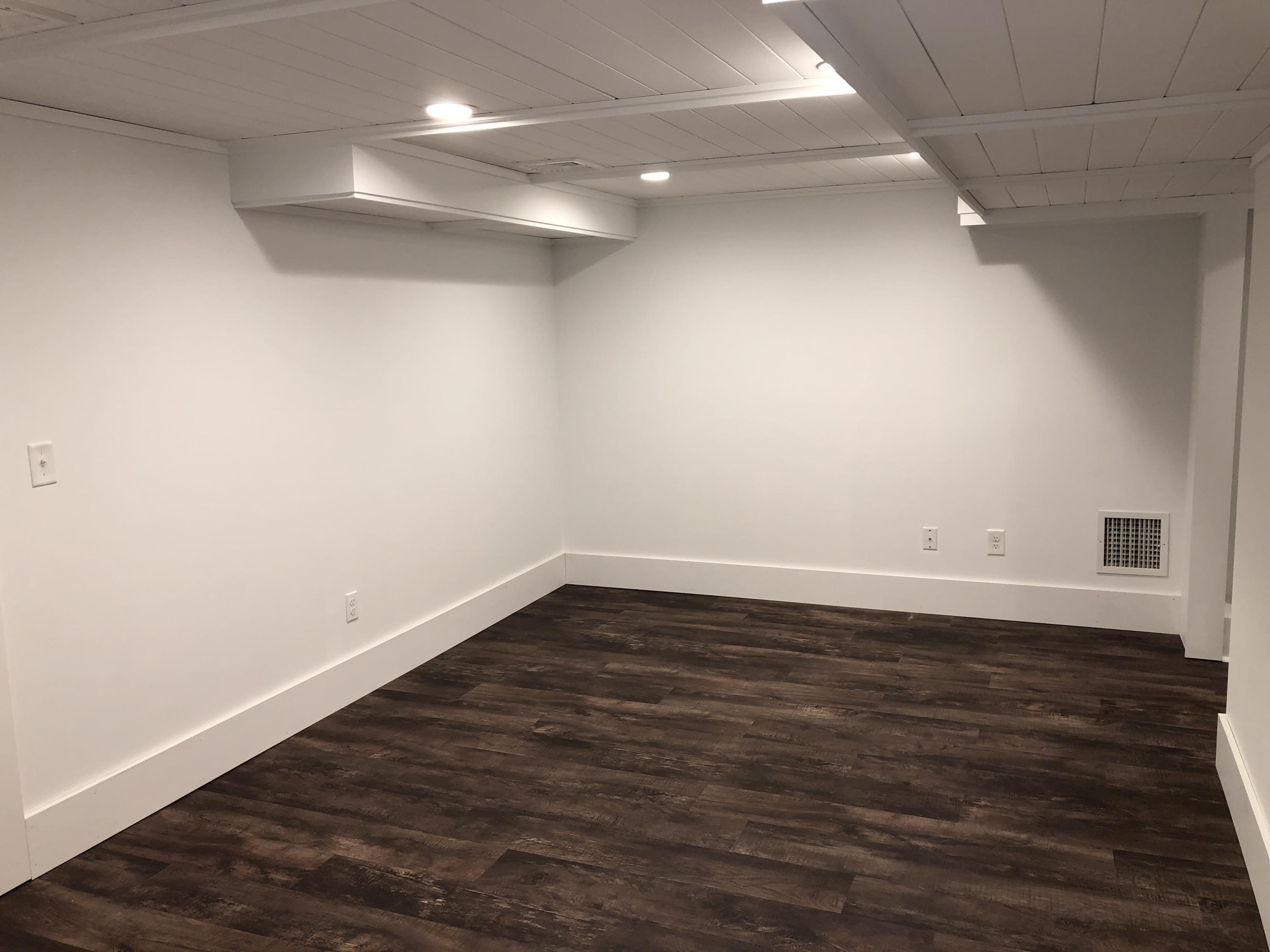 640 Setucket Road East Dennis, MA 02660 - Photo 49 of 57 a view of an empty room with wooden floor