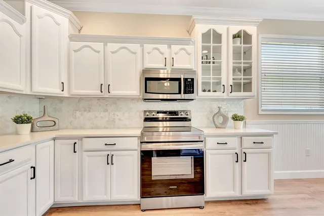 a bathroom with a double vanity sink and mirror