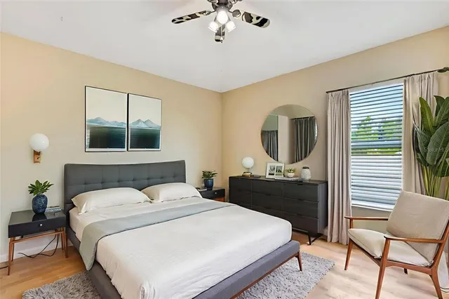 a swimming pool with outdoor seating