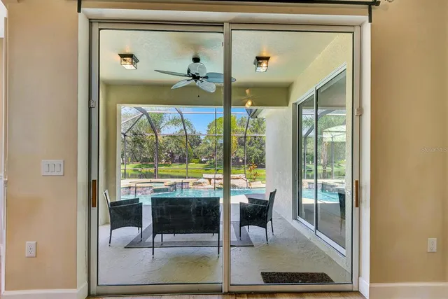 a view of a lake with houses in the back