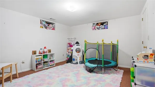 a bed room with a bed and a couch