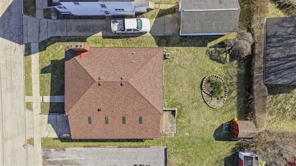 an aerial view of a city with lots of residential buildings