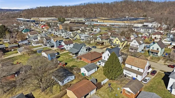 an aerial view of a city with lots of residential buildings