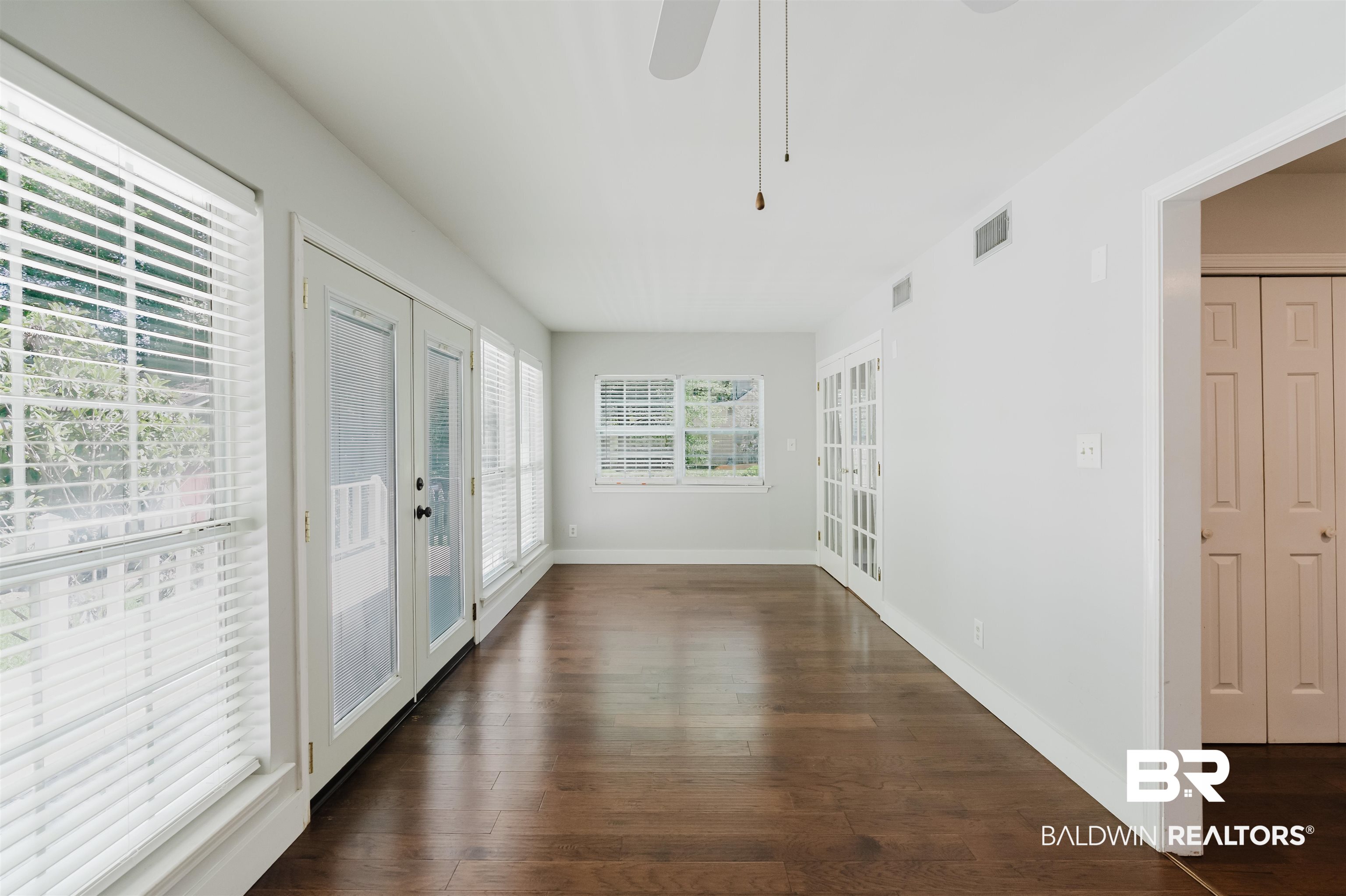 20460 Bishop Road Fairhope, AL 36532 - Photo 19 of 41 Unfurnished sunroom featuring french doors