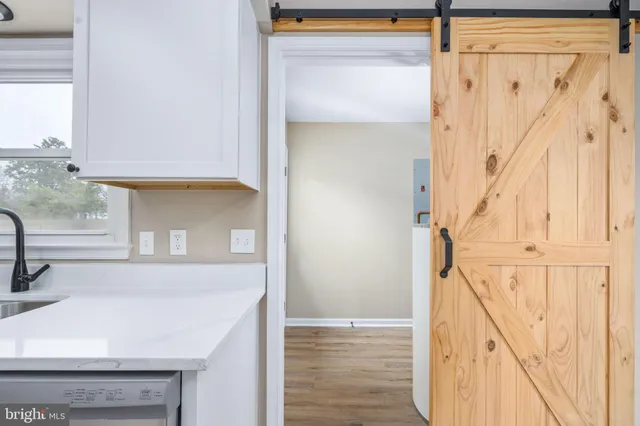 a view of front door with hallway
