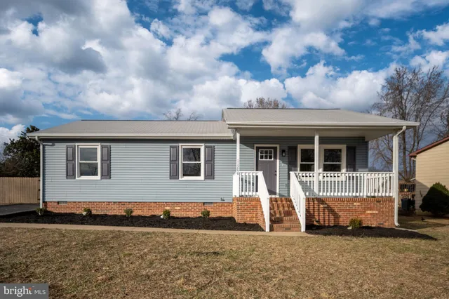 a house view with a garden space