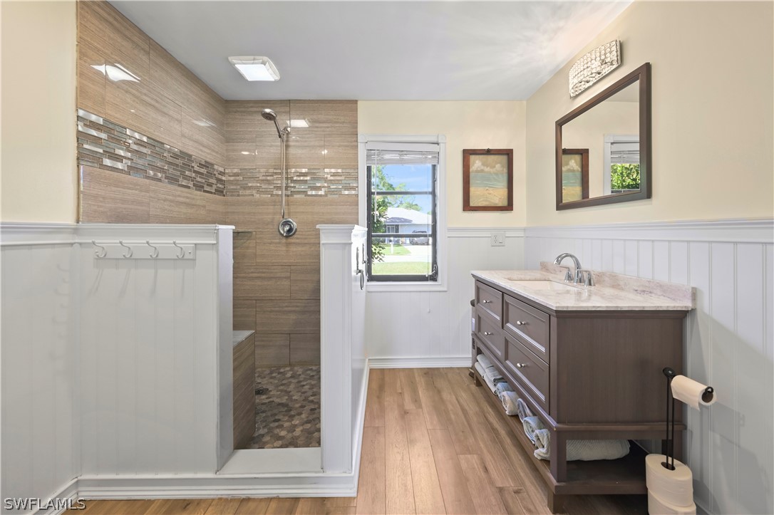 17413 Butler Road Fort Myers, FL 33967 - Photo 11 of 33 a bathroom with a sink and a mirror