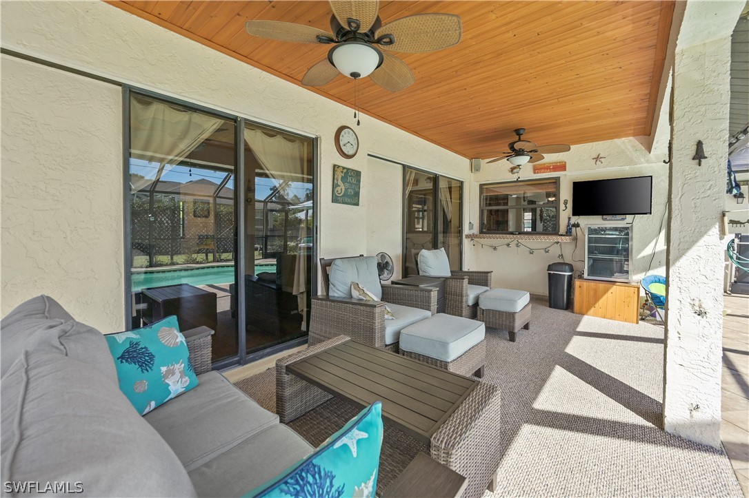 17413 Butler Road Fort Myers, FL 33967 - Photo 15 of 33 a living room with furniture and a flat screen tv