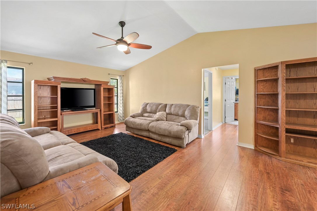 17413 Butler Road Fort Myers, FL 33967 - Photo 18 of 33 a living room with furniture and a flat screen tv
